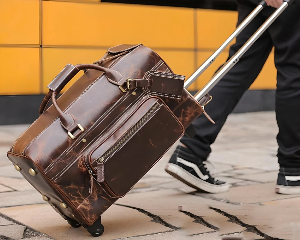 brown leather carry on bag
