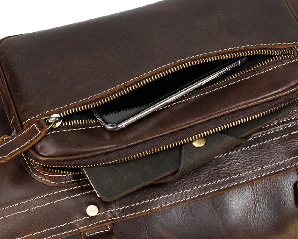 brown leather carry on bag